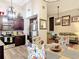 Bright kitchen and dining area with modern appliances and seamless flow to living area at 219 E Fern Dr, Orange City, FL 32763