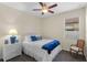 Comfortable bedroom with natural light and a ceiling fan at 2210 Romanum Dr, Winter Garden, FL 34787