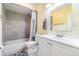 Bright bathroom featuring a shower-tub combo, white vanity, and neutral wall paint at 236 Longhorn Dr, Apopka, FL 32712