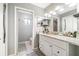 Bathroom featuring a white vanity with countertop space, tile flooring, and neutral wall paint at 236 Longhorn Dr, Apopka, FL 32712