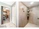 Tiled walk-in shower featuring decorative details with a shower caddy at 236 Longhorn Dr, Apopka, FL 32712