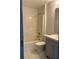 Full bathroom featuring tiled floors, a combination tub and shower, and a single sink vanity at 2421 Queenswood Cir, Kissimmee, FL 34743