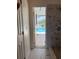 The updated shower and marble tile extend to the pool area at 2421 Queenswood Cir, Kissimmee, FL 34743