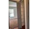 View of bedroom with walk in closet, carpeted floors, and view to the outside at 2421 Queenswood Cir, Kissimmee, FL 34743