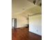 Open-concept living room with hardwood floors at 2421 Queenswood Cir, Kissimmee, FL 34743