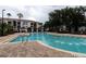 Beautiful community pool with fountain features and ample space for lounging and recreation at 2525 Maitland Crossing Way # 202, Orlando, FL 32810