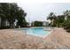 Inviting community pool area featuring clear water and comfortable lounge areas for relaxation and socializing at 2525 Maitland Crossing Way # 202, Orlando, FL 32810