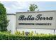Bella Terra Condominium Community sign with attractive landscaping in a well-maintained neighborhood at 2525 Maitland Crossing Way # 202, Orlando, FL 32810