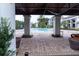 Community pool with lush landscaping providing a relaxing atmosphere and shaded seating areas at 2525 Maitland Crossing Way # 202, Orlando, FL 32810