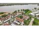 Breathtaking view of lakefront condos with lush landscaping and a community pool at 260 Killarney Bay Ct # 6-6, Winter Park, FL 32789