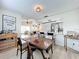 Bright dining area adjacent to the kitchen and living room, offering an open and connected living space at 260 Killarney Bay Ct # 6-6, Winter Park, FL 32789
