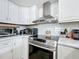 Well-equipped kitchen with stainless steel appliances, subway tile backsplash, and ample counter space at 260 Killarney Bay Ct # 6-6, Winter Park, FL 32789