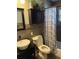 Bathroom features a vessel sink, updated tiles, and shower tub combo at 2648 Amsden Rd, Winter Park, FL 32792