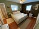 Inviting bedroom with wood floors and plenty of natural light at 2648 Amsden Rd, Winter Park, FL 32792