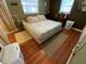 Inviting bedroom with wood floors and plenty of natural light at 2648 Amsden Rd, Winter Park, FL 32792