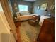Comfortable bedroom with a daybed, an armchair, and stylish decor at 2648 Amsden Rd, Winter Park, FL 32792
