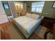 Well-lit bedroom with en-suite bath access and comfortable layout at 2648 Amsden Rd, Winter Park, FL 32792
