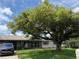 Charming single story home with a large tree offering plenty of shade and curb appeal at 2648 Amsden Rd, Winter Park, FL 32792