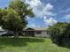 Well-maintained single story home with a lush lawn and mature landscaping at 2648 Amsden Rd, Winter Park, FL 32792