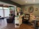 Home office with a large desk area and fireplace, creating a comfortable workspace at 2648 Amsden Rd, Winter Park, FL 32792