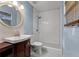 Updated bathroom features a walk-in shower with subway tile and black and white patterned tile flooring at 2915 Dean Ridge Rd, Orlando, FL 32825