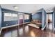 Bright living room with hardwood floors, a ceiling fan, and a cozy couch, creating a welcoming atmosphere at 2915 Dean Ridge Rd, Orlando, FL 32825