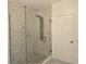 Modern bathroom with a full glass shower and designer tile at 3030 Clubview Dr # Ge, Orlando, FL 32822