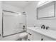 Bathroom with updated sink and hardware, tiled shower, and frameless glass doors at 3030 Clubview Dr # Ge, Orlando, FL 32822