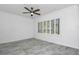Bedroom with shuttered windows, ceiling fan and gray tile flooring at 3030 Clubview Dr # Ge, Orlando, FL 32822