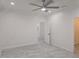 Minimalist bedroom design with tiled floors and neutral color palette at 3030 Clubview Dr # Ge, Orlando, FL 32822