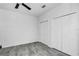 Second bedroom with tile flooring and closet storage at 3030 Clubview Dr # Ge, Orlando, FL 32822