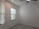 Bright bedroom with natural light and neutral finishes at 3030 Clubview Dr # Ge, Orlando, FL 32822