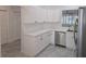 Bright kitchen boasts ample counter space and updated appliances, perfect for cooking and entertaining at 3030 Clubview Dr # Ge, Orlando, FL 32822
