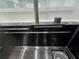 Modern kitchen sink featuring a sleek design and a convenient built-in spray function at 3030 Clubview Dr # Ge, Orlando, FL 32822