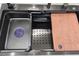 Functional sink featuring a built-in strainer and cutting board for efficient food preparation at 3030 Clubview Dr # Ge, Orlando, FL 32822