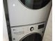 Stacked washer and dryer laundry appliance at 3030 Clubview Dr # Ge, Orlando, FL 32822