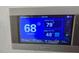 Programmable thermostat displaying current temperature, humidity, and system status at 3030 Clubview Dr # Ge, Orlando, FL 32822