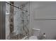 Modern bathroom with marble and stone shower, offering a luxurious spa-like experience at 3176 Feltrim Pl # 302, Kissimmee, FL 34747