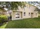 Spacious backyard features lush green grass, perfect for outdoor activities and relaxation at 3537 Seneca Club Loop # B, Orlando, FL 32808