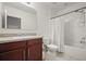Bathroom featuring a single sink vanity with a shower and bathtub combination at 3537 Seneca Club Loop # B, Orlando, FL 32808