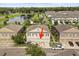 Townhouse with a three-car garage surrounded by lush landscaping in a Gathering-friendly neighborhood at 3537 Seneca Club Loop # B, Orlando, FL 32808