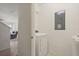 Efficient laundry room with a modern, front-load washer for convenient and easy chore management at 3537 Seneca Club Loop # B, Orlando, FL 32808