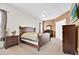 Cozy bedroom with carpeted floors, ceiling fan, and warm color accents throughout at 3954 Old Dunn Rd, Apopka, FL 32712