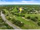 Beautiful aerial shot of the property situated on a lush golf course at 3966 Villas Green, Longwood, FL 32779