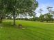 Picturesque view of the lush green golf course showcasing the serene community setting at 3966 Villas Green, Longwood, FL 32779
