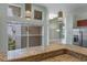 Bright kitchen view with granite counters and stainless refrigerator, plenty of natural light at 3966 Villas Green, Longwood, FL 32779