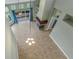 Spacious living room featuring a high ceiling, tile floors, and a fireplace at 3966 Villas Green, Longwood, FL 32779