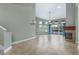 Bright living room boasts soaring ceilings, fireplace, and sliding doors leading to an outdoor patio at 3966 Villas Green, Longwood, FL 32779