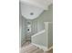 Staircase with neutral carpeting and natural light from a high window at 3966 Villas Green, Longwood, FL 32779