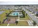 Aerial view of the neighborhood pool, playground, and amenities area in the community at 3975 Silverstream Ter, Sanford, FL 32771
